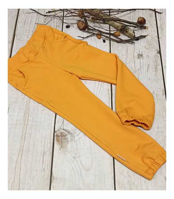 Spodnie z kieszeniami musztardowo-pomarańczowe